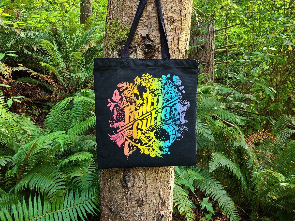 Rainbow ombre fruit graphic tote bag, hand-drawn design, black canvas