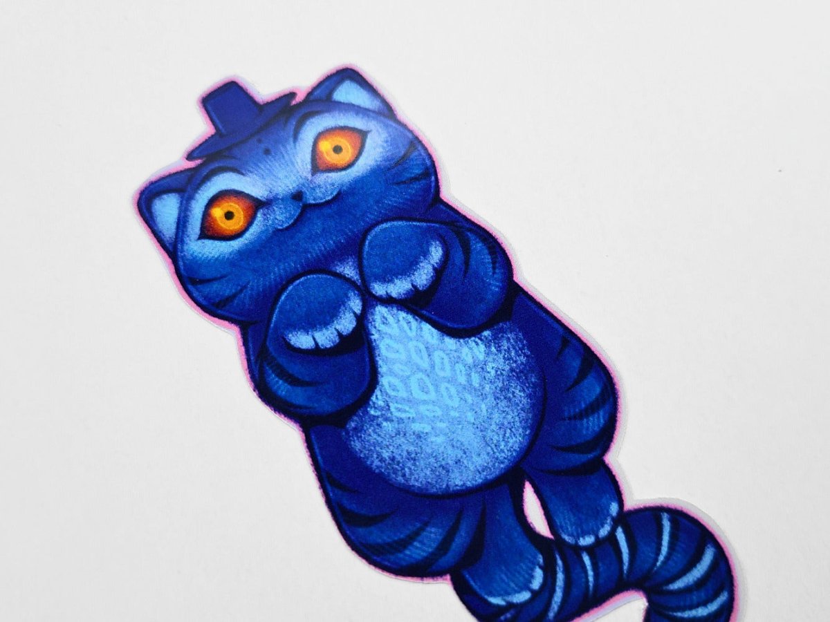 Derpy tiger sticker on a light gray background
