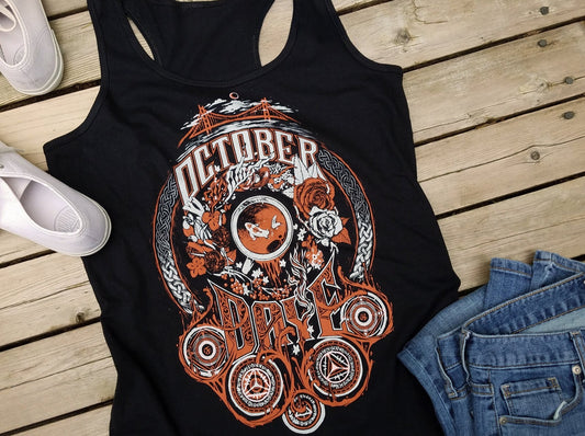A black graphic tank top with a tyopgraphic illustration that reads "October Daye". The Illustration includes roses, koi, and other iconography from the book series October Daye by Seanan McGuire.