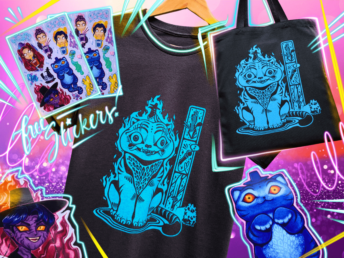 Black t-shirt with blue graphic design of Derpy Tiger, surrounded by colorful stickers and a tote bag.