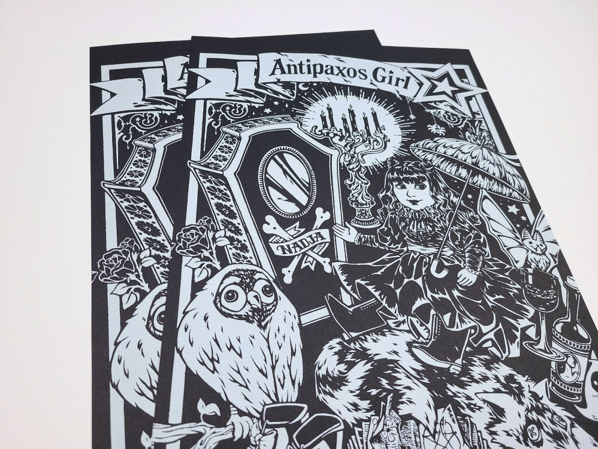 Black and white illustration of a Nadja Doll with an owl and text on a white background