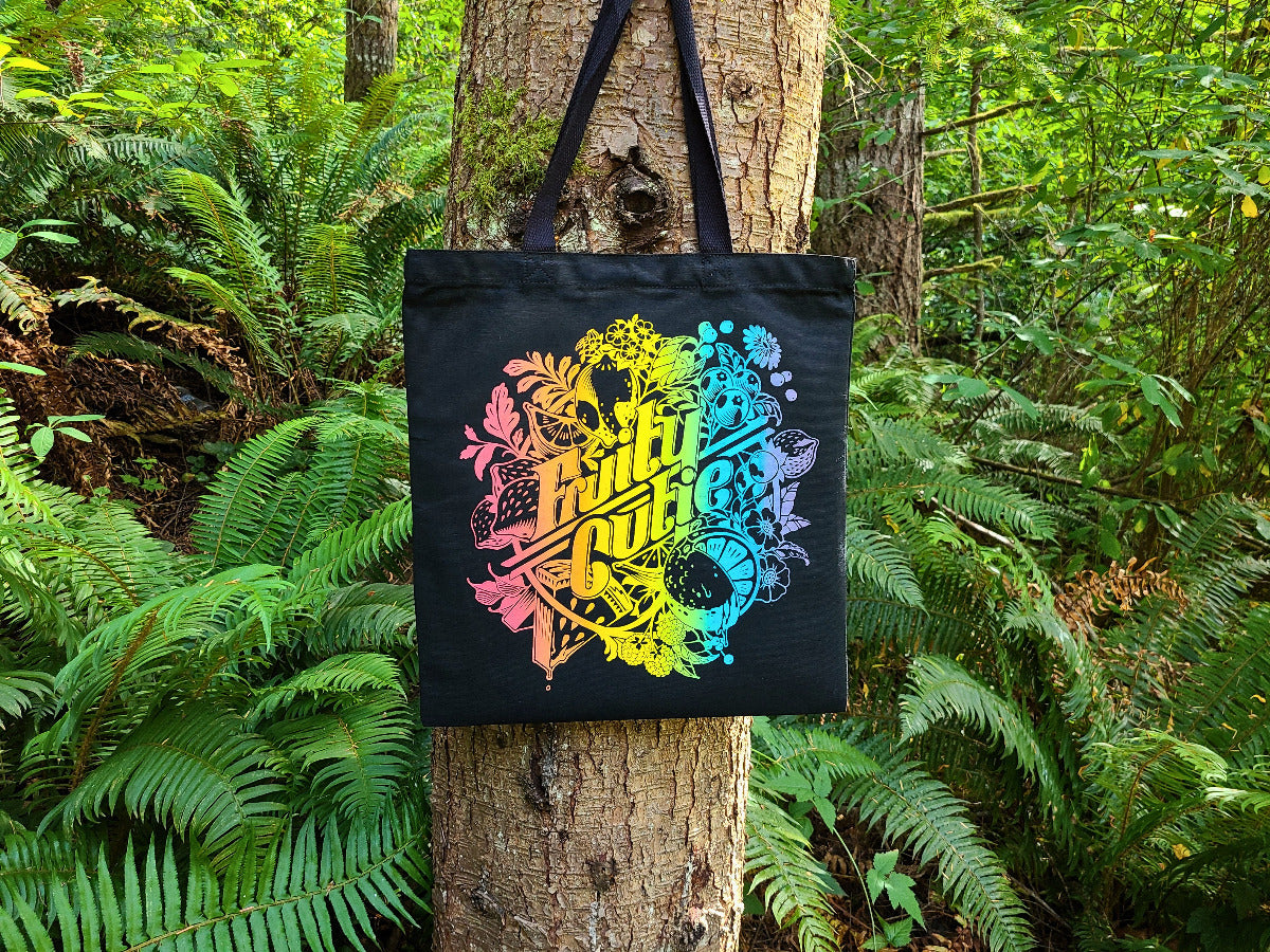 Rainbow ombre fruit graphic tote bag, hand-drawn design, black canvas