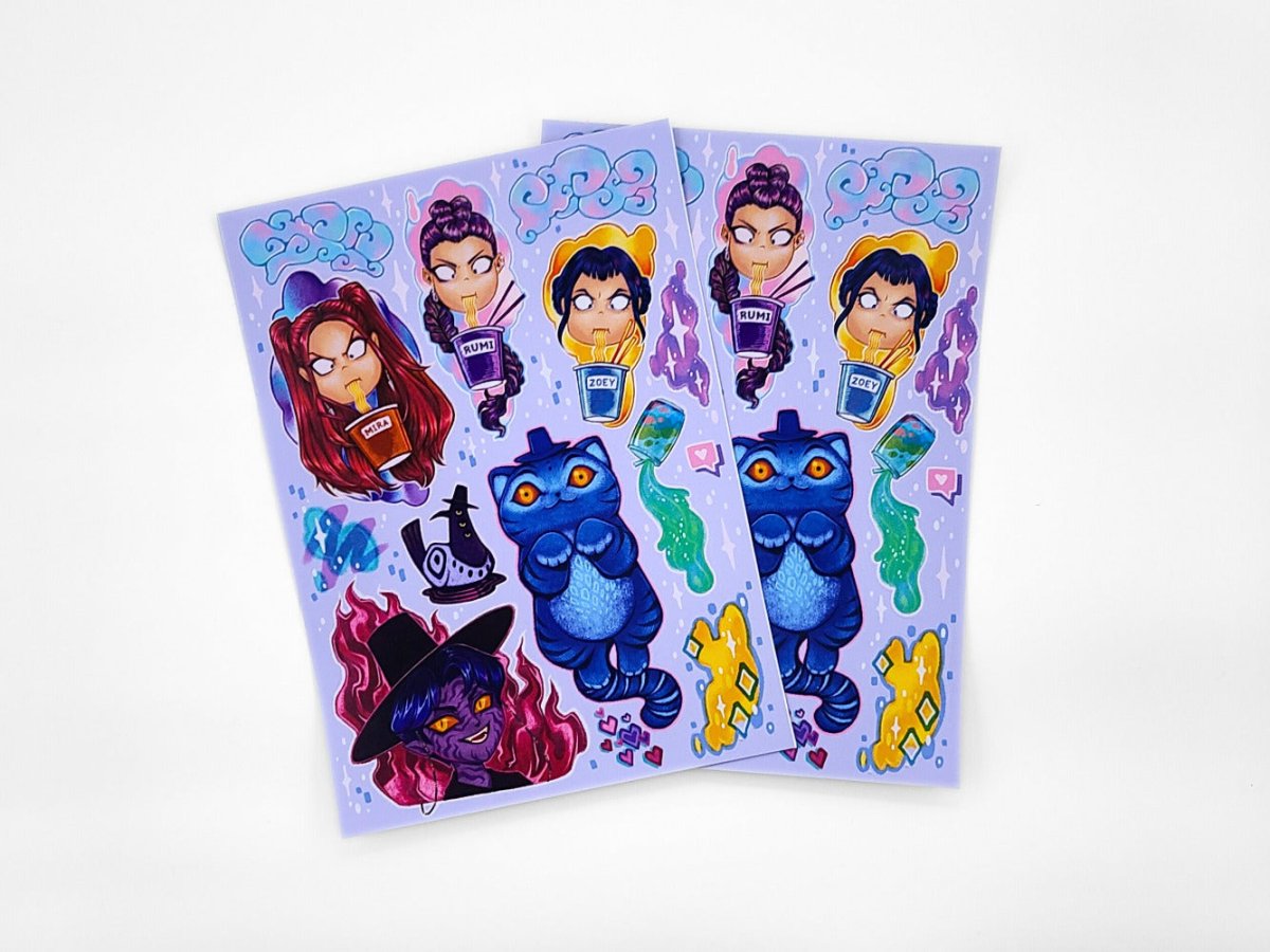 Two sheets of colorful stickers featuring kpop demon hunters and derpy tiger on a white background. 