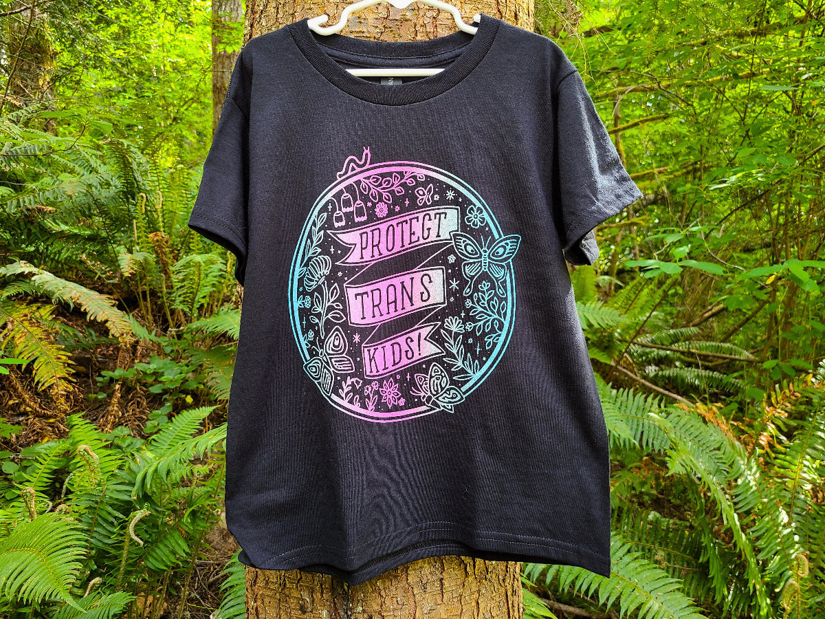 Black t-shirt with trans pride ombre gradient design, protect trans kids graphic tee
