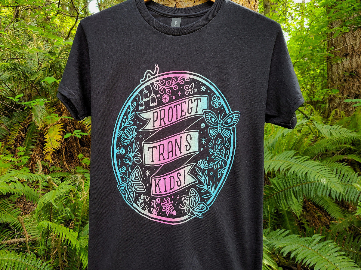 Black t-shirt with trans pride ombre gradient design, protect trans kids graphic tee